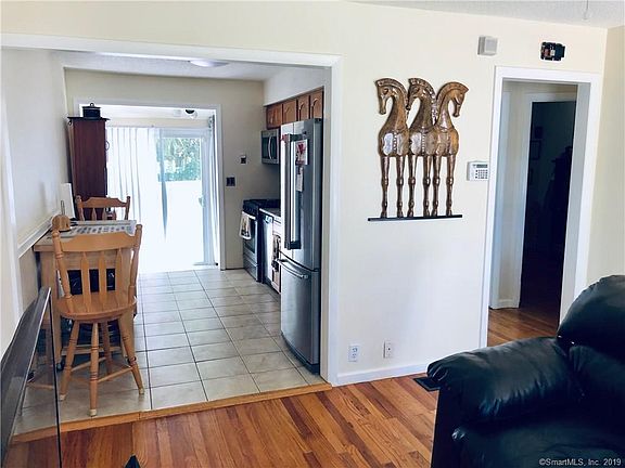 Kitchen opens to living area.
