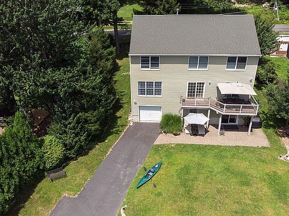 Lake view lawn, patio + deck