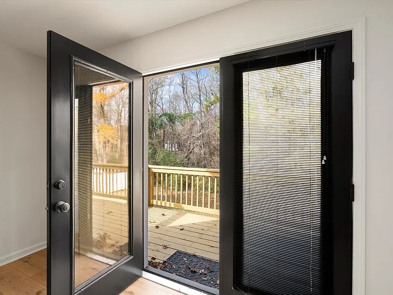 French doors in primary bedroom