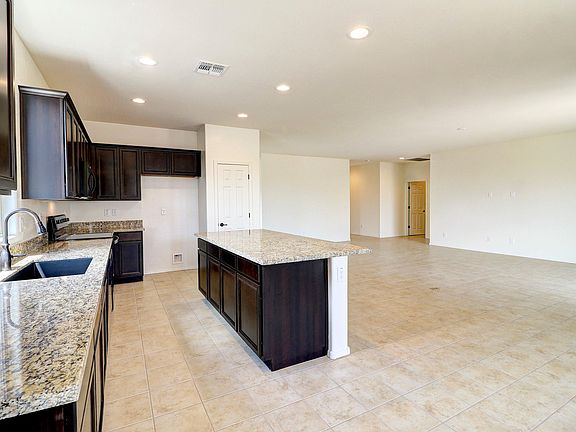 5th image of 15887 W Port Royale Ln