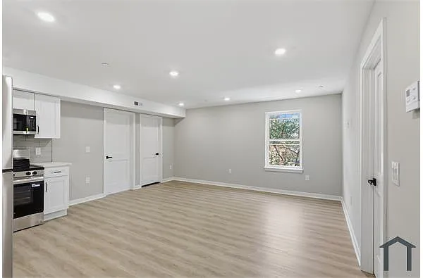 Building Photo - 4129 Ogden St #5