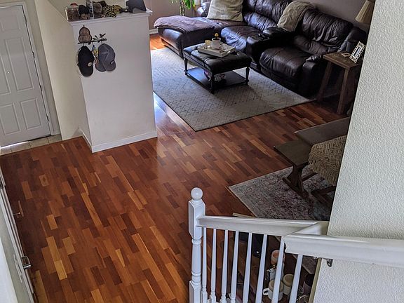 Living room area. Open floor plan w/ dining room and kitchen.