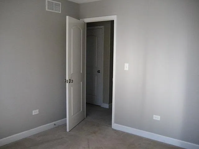 Bedroom 1 looking into Hallway and Hallway Closet