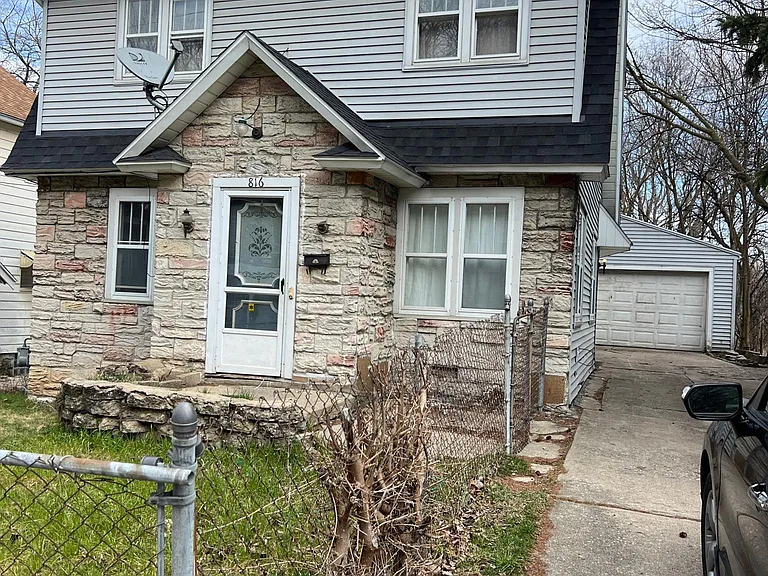 Front Exterior with garage in the background