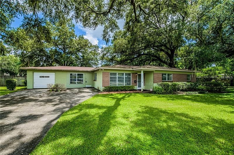 A Brandon Gem ! Gorgeous Oak trees, you can move in and work on a room at a time !