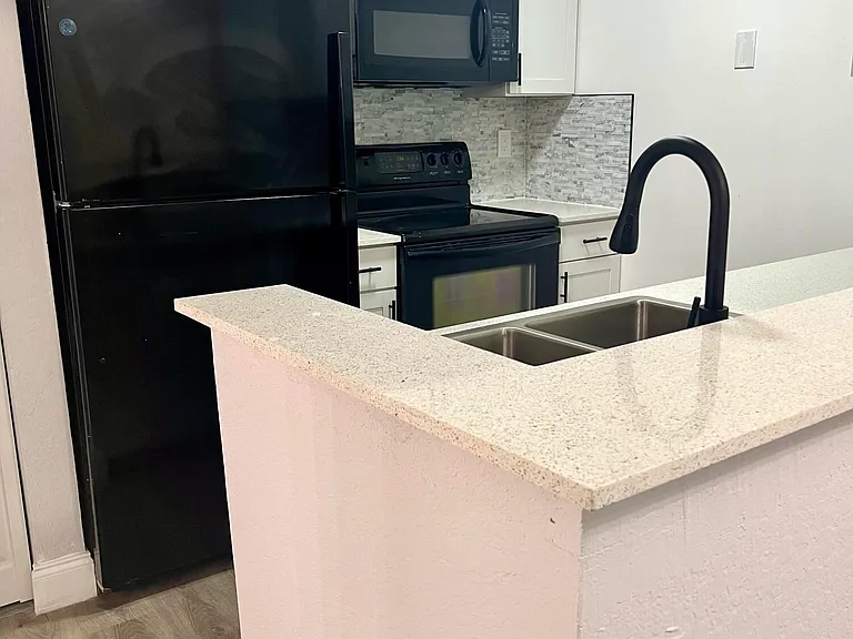 2820 N Oakland Forest Dr #203 — Photo 3