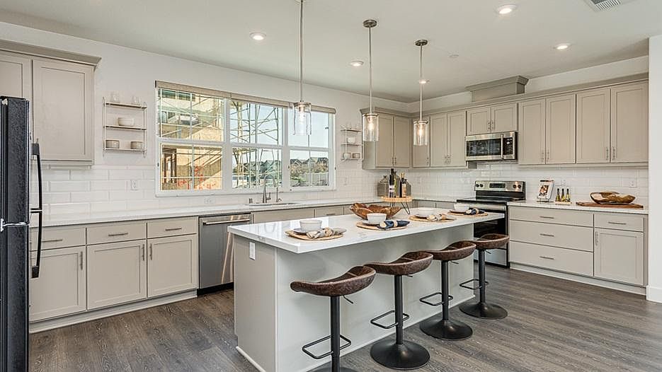 Gorgeous kitchen with Quartz counters and an oversized Island. Furniture not included
