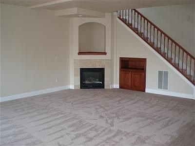 Living room with corner fireplace!