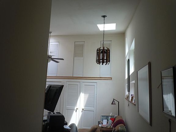 section of living room ( extra storage above)