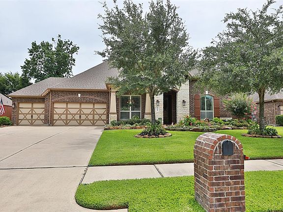 Four bedrooms AND a 4 car garage!