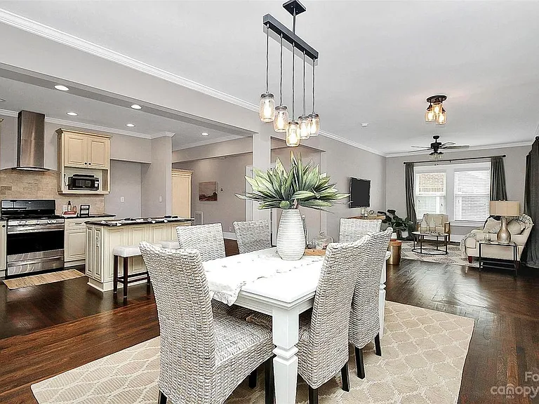 Modern Open Concept Living + Dining + Kitchen with large windows