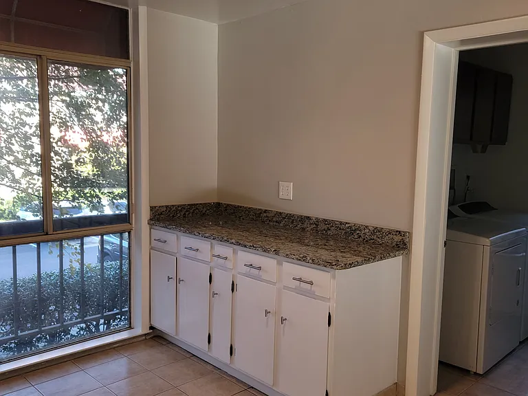 Kitchen cabinets and laundry room