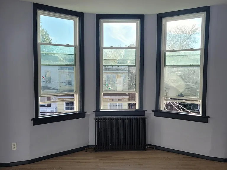 Picture of the main bedroom from the livingroom/entrance. Lots of light as well as a walk in closet/small office to the left.