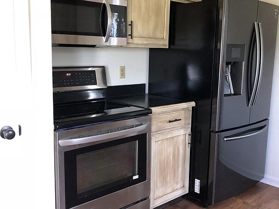 Brand new refrigerator and microwave. Large oven.