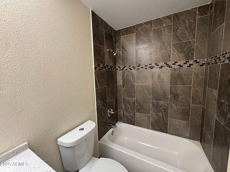 5502 W Frier Dr — Photo 22