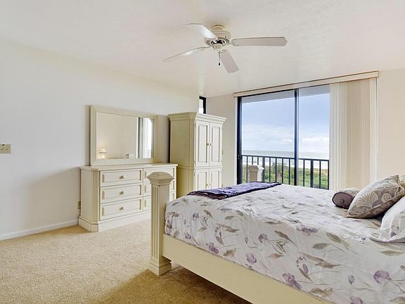 Master bedroom with oceanfront balcony