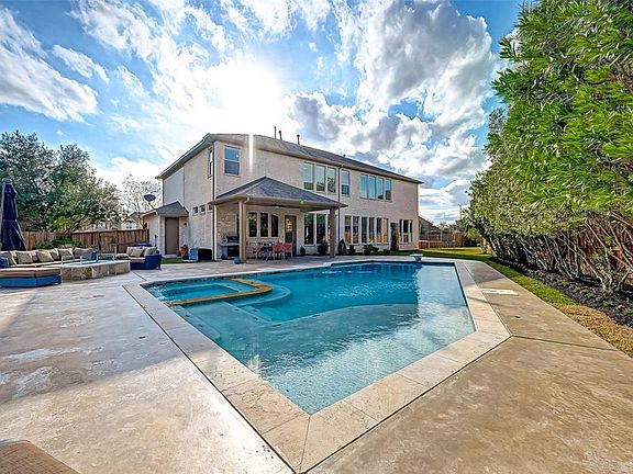 Your Huge Backyard is complete with a Pool and Spa!