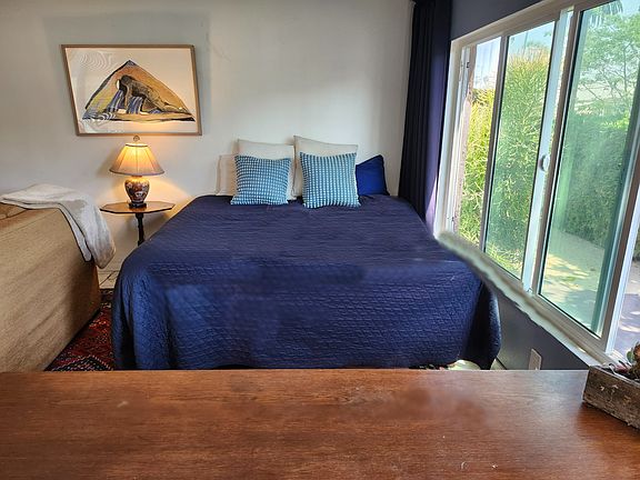 Queen bed with blackout curtains