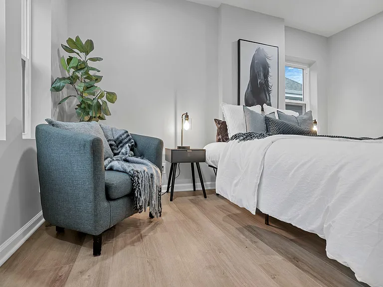 Design-layout luxury bedroom with extra windows on a corner townhome with gorgeous natural light