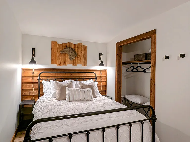 UPSTAIRS BEDROOM 2 (sleeps 4 total): Queen Size Bed and Convenient Charging Station Nightstands