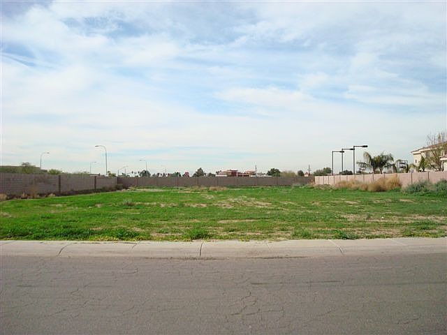 almost 3/4 of an acre level custome lot
