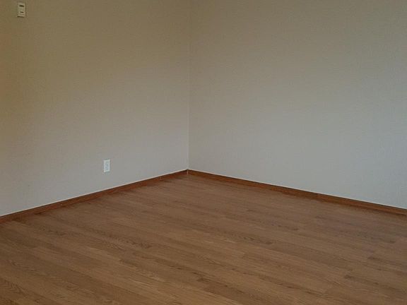 Spacious living room with laminate flooring
