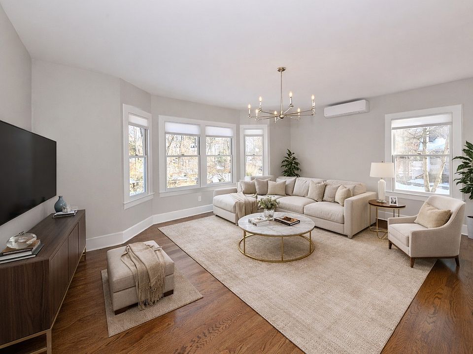 Sunny, spacious, & inviting Living Room