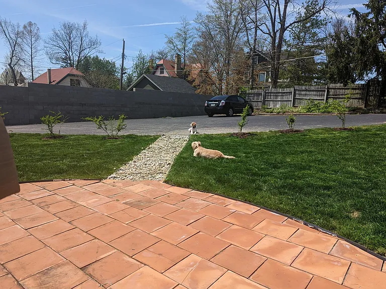 Back yard with wonderful new patio and new Trex deck.