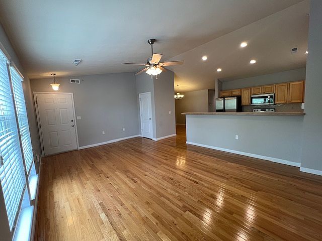 Entry and Living room with coat closet.