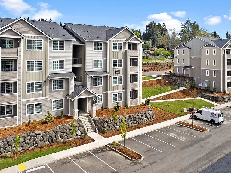 Apartment Building Exterior + Resident Walkway