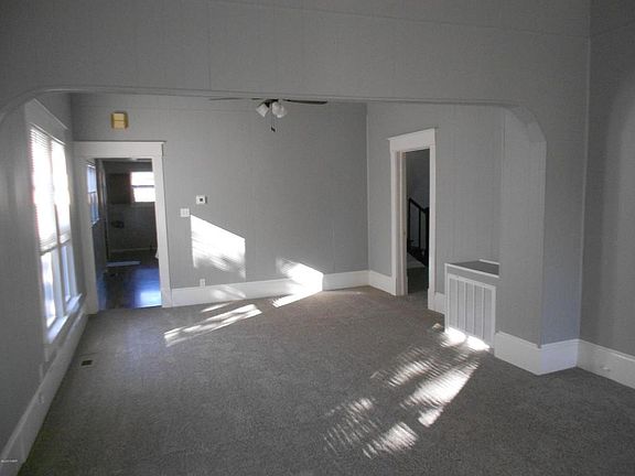 As you walk in the front door, you have a newly carpeted living room and dining area.