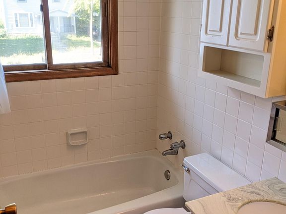 bathroom tub and window