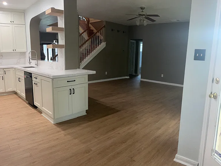 View of Living Room from Breakfast Nook. Space feels both cozy and elegant with the tall ceilings.