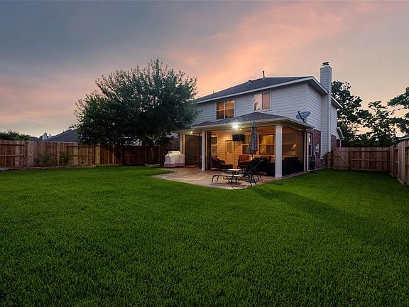 As you can see, there is plenty of space to add a pool if you would like! Stamped concrete area perfect for sunbathing. A well manicured yard, big enough to brag about to your friends!