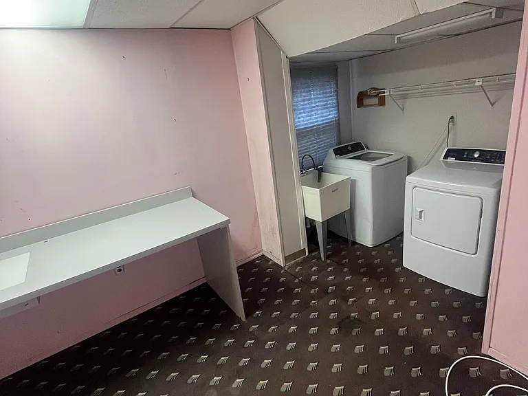 Laundry/office/storage space off breakfast area