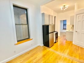 306 E 11th St