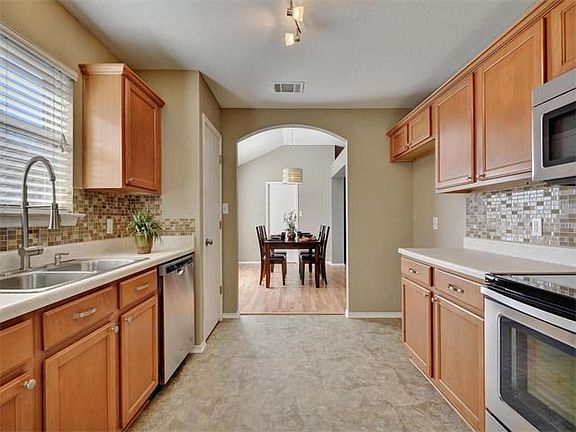 Kitchen features all new stainless steel appliances.