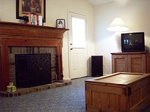 Family room features vaulted ceiling and a fireplace