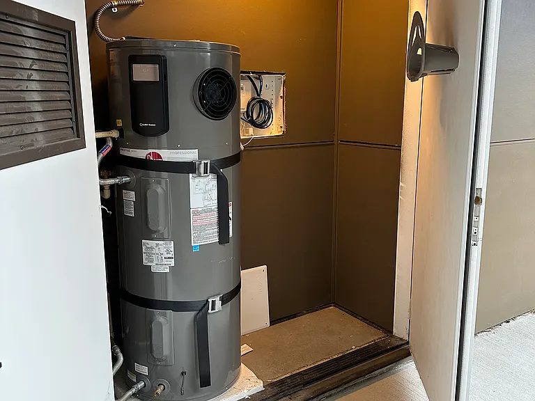Water heater, storage and media box with unswitched AC power for modem and router.