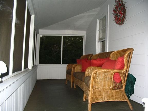 Enjoy cool breeze on Screened porch