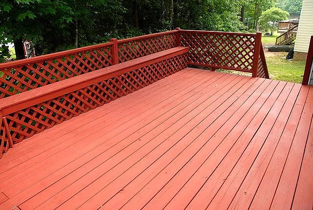 Beautiful redwood deck with views of the lake and perfect for grilling out or relaxing outdoors.
