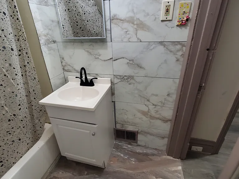 6609 Saint Louis Ave — Photo 18