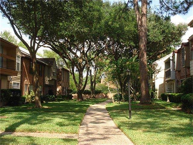 Enjoy the tree lined courtyards throughout this complex