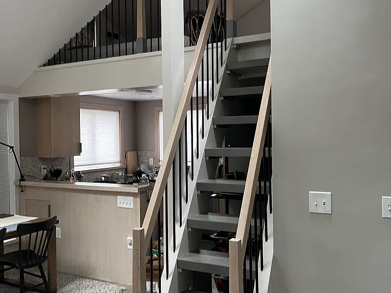 Very secure & fun ship ladder-solid oak railing to sleeping loft.