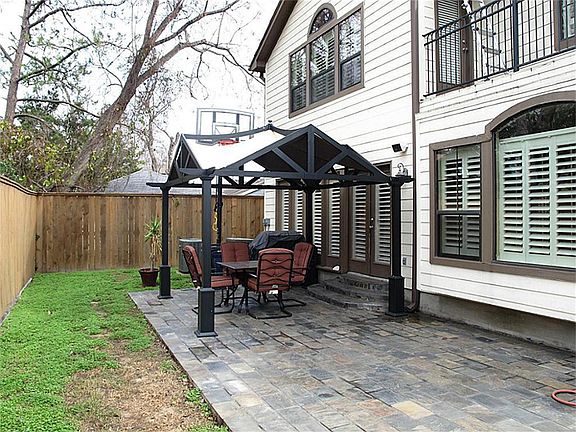 Tranquil backyard is perfect for barbecues or outdoor entertaining!