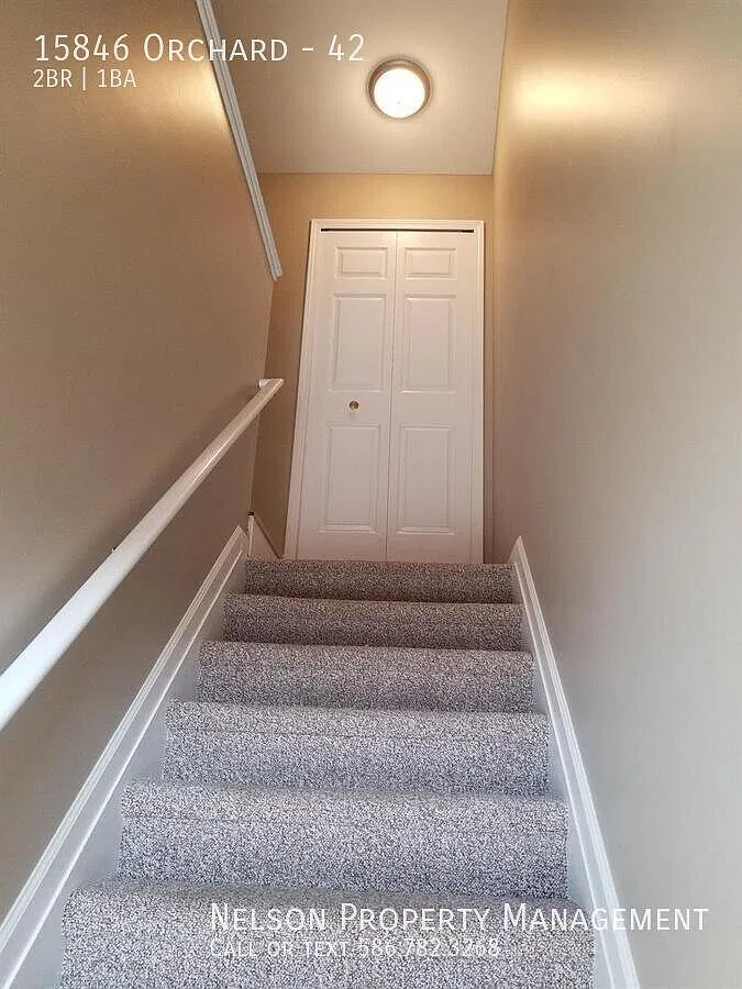 Spacious 2-Bedroom Upper Condo with Raised Ceilings and Modern Finishes & All Appliances — Photo 2