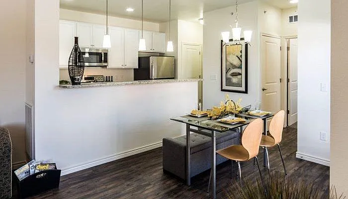 Living room, dining room, and kitchen have Shaw LPV flooring
