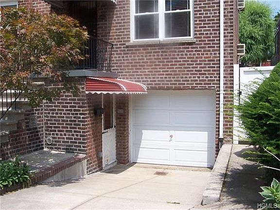 One-car garage and lower front entrance.