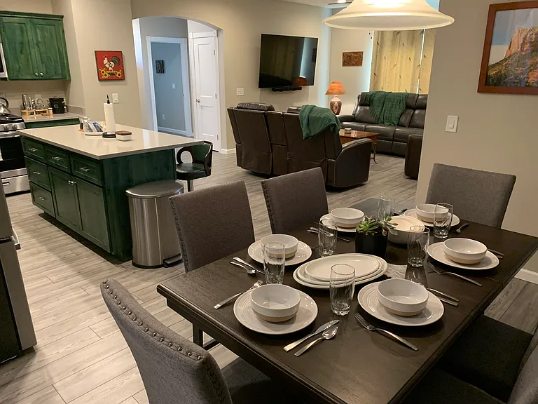 A view of the dining area to the kitchen and living room.