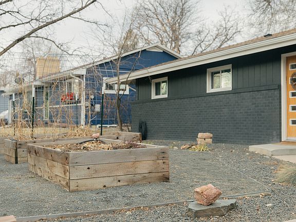 Three irrigated garden beds receive ample sunlight